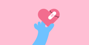 Cartoon image of blue dragon paw holding a heart with a crack and bandage